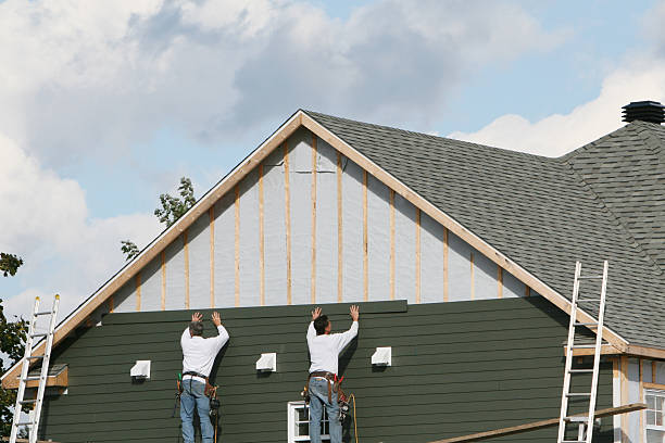 Professional Siding Replacement technician working in McClellandtown, PA